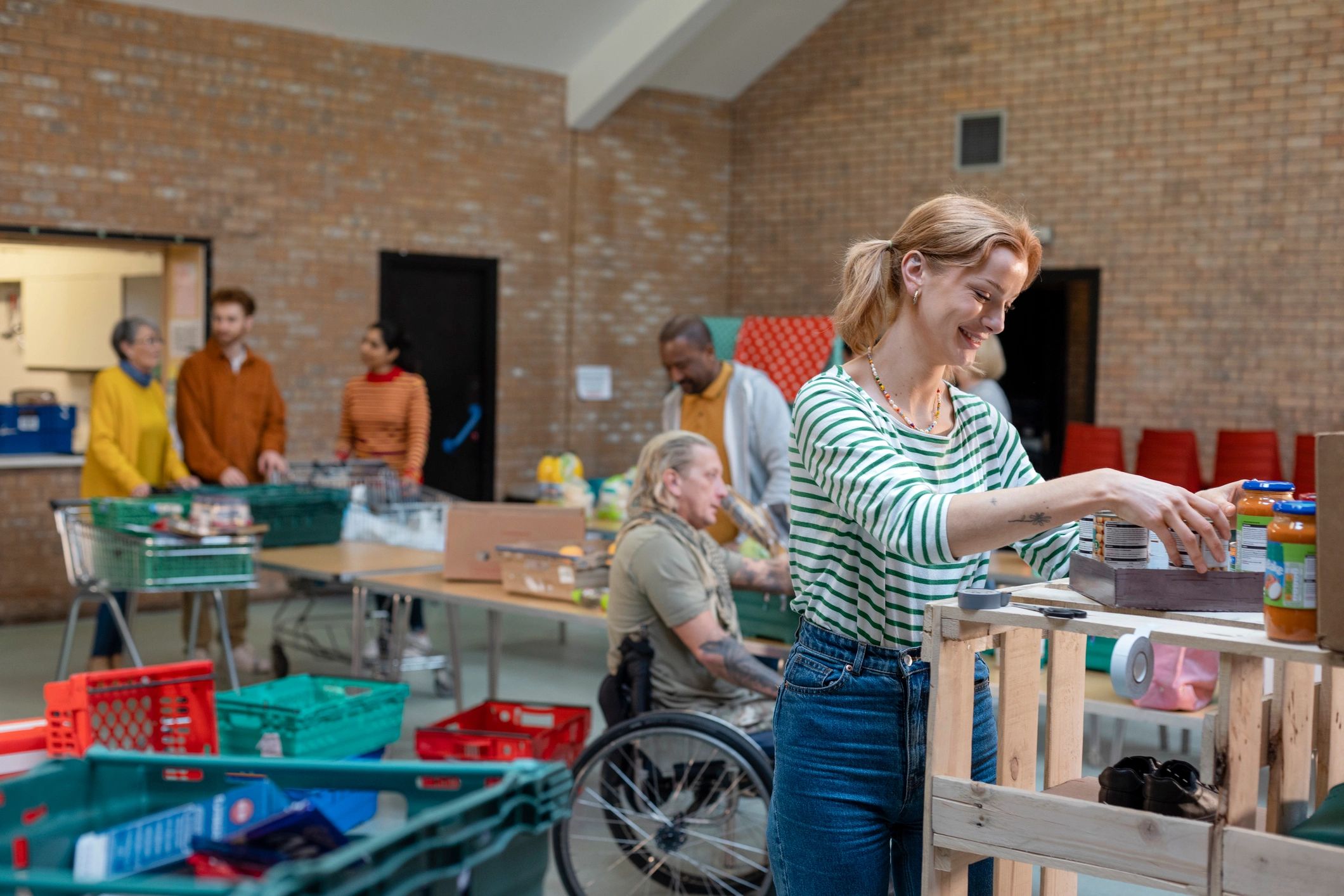 Community volunteers working together indoors